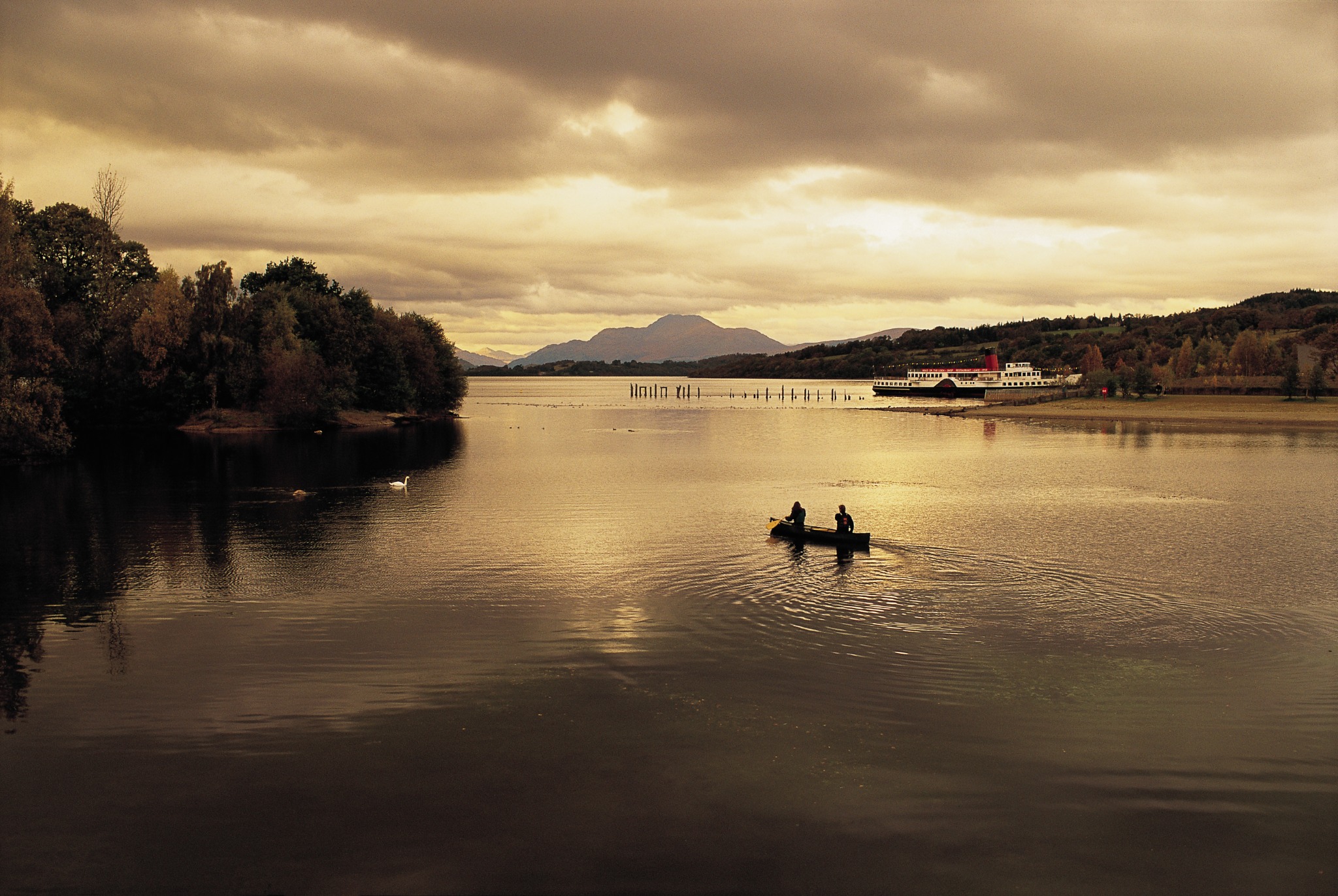Canoe on Loch Lomond at sunset