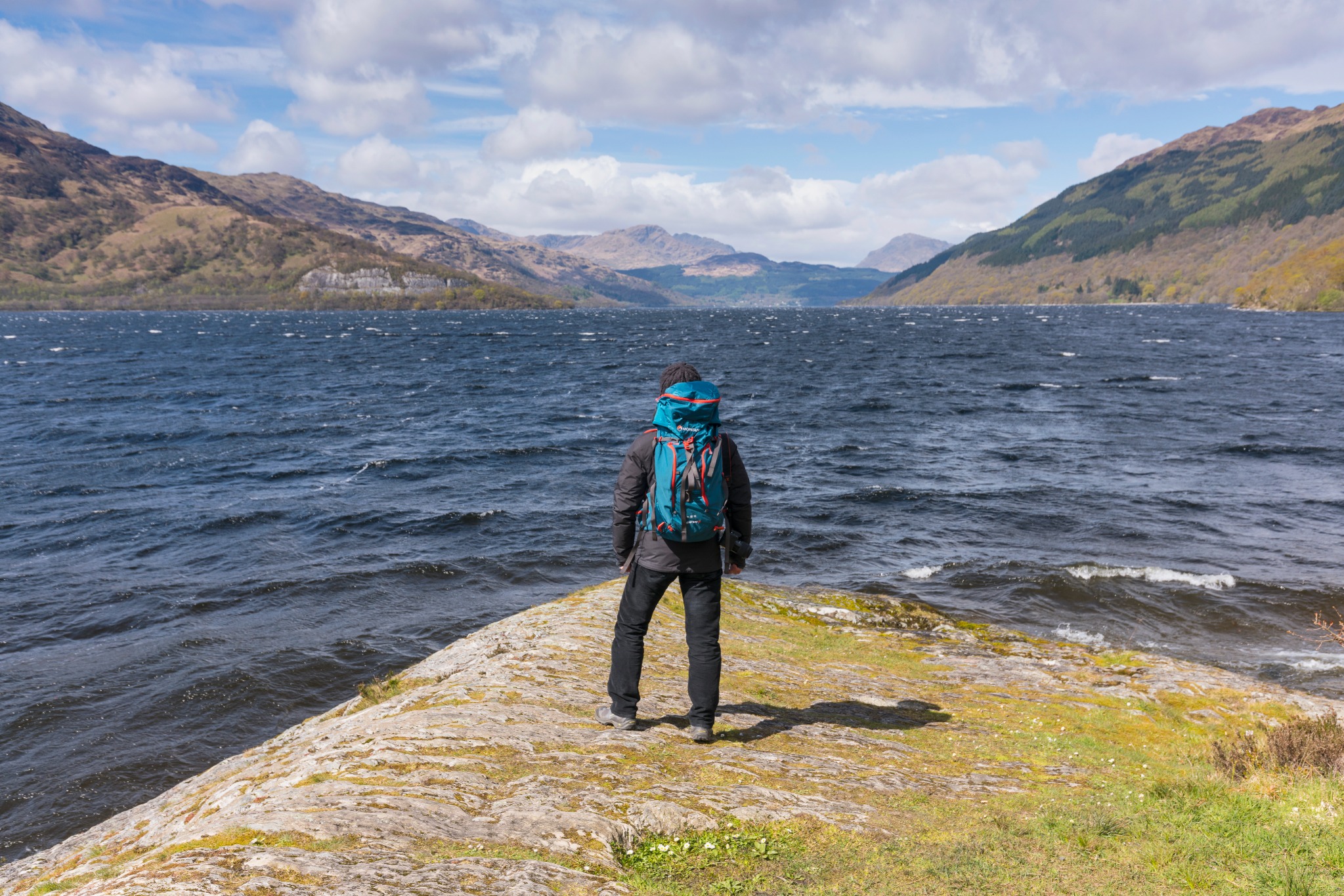 Person looking across the loch